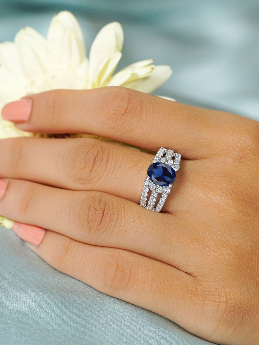 2.5 Carat Oval Sapphire Solitaire Cluster Ring