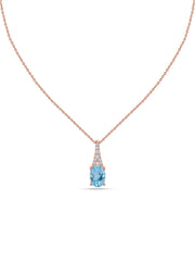 Blue Topaz Oval Gold Pendant with Sparkling Diamonds